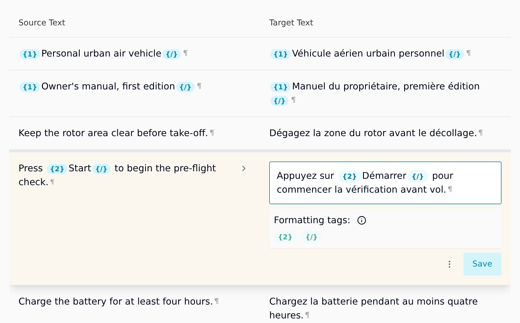 Taia's translation editor with an English owner's manual on the left and its French translation on the right, one sentence per row, formatting tags shown as small numbered chips