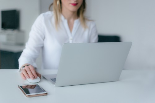 Business woman doing work on her computer