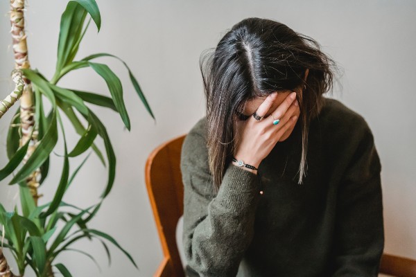 Woman stressed because of all the translation errors